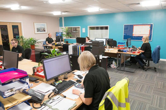 Direct4x4 office workers with desks, computers and stationery