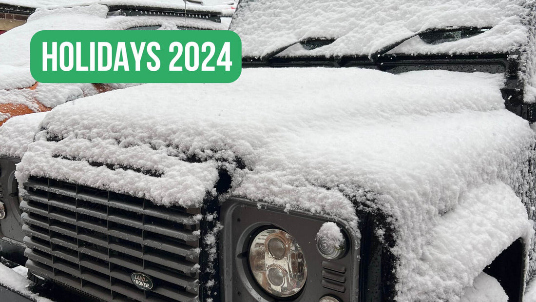 Photo of a snow covered Land Rover Defender