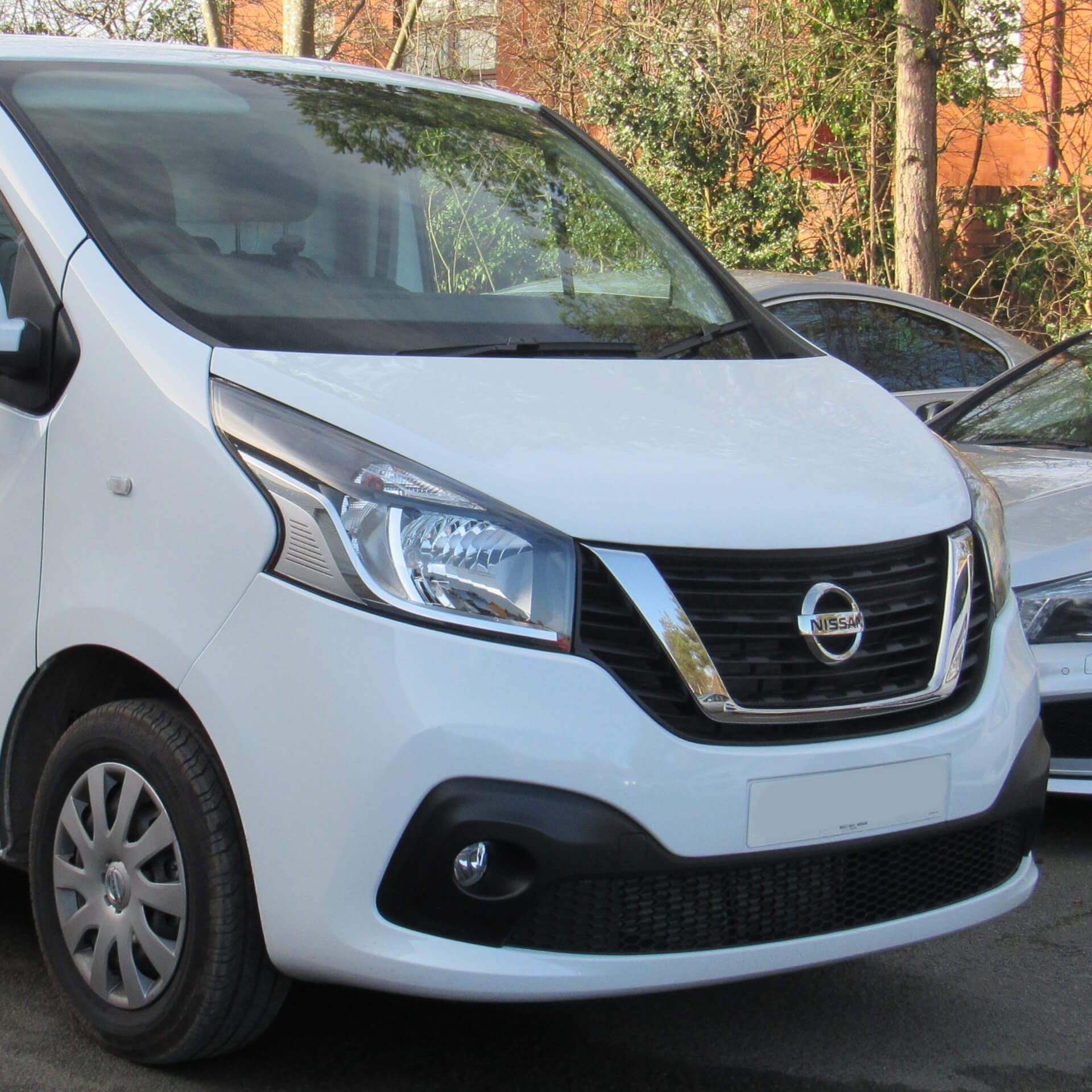 Direct4x4 accessories for Nissan NV300 vehicles with a photo of the front of a white Nissan NV300 parked in a car park