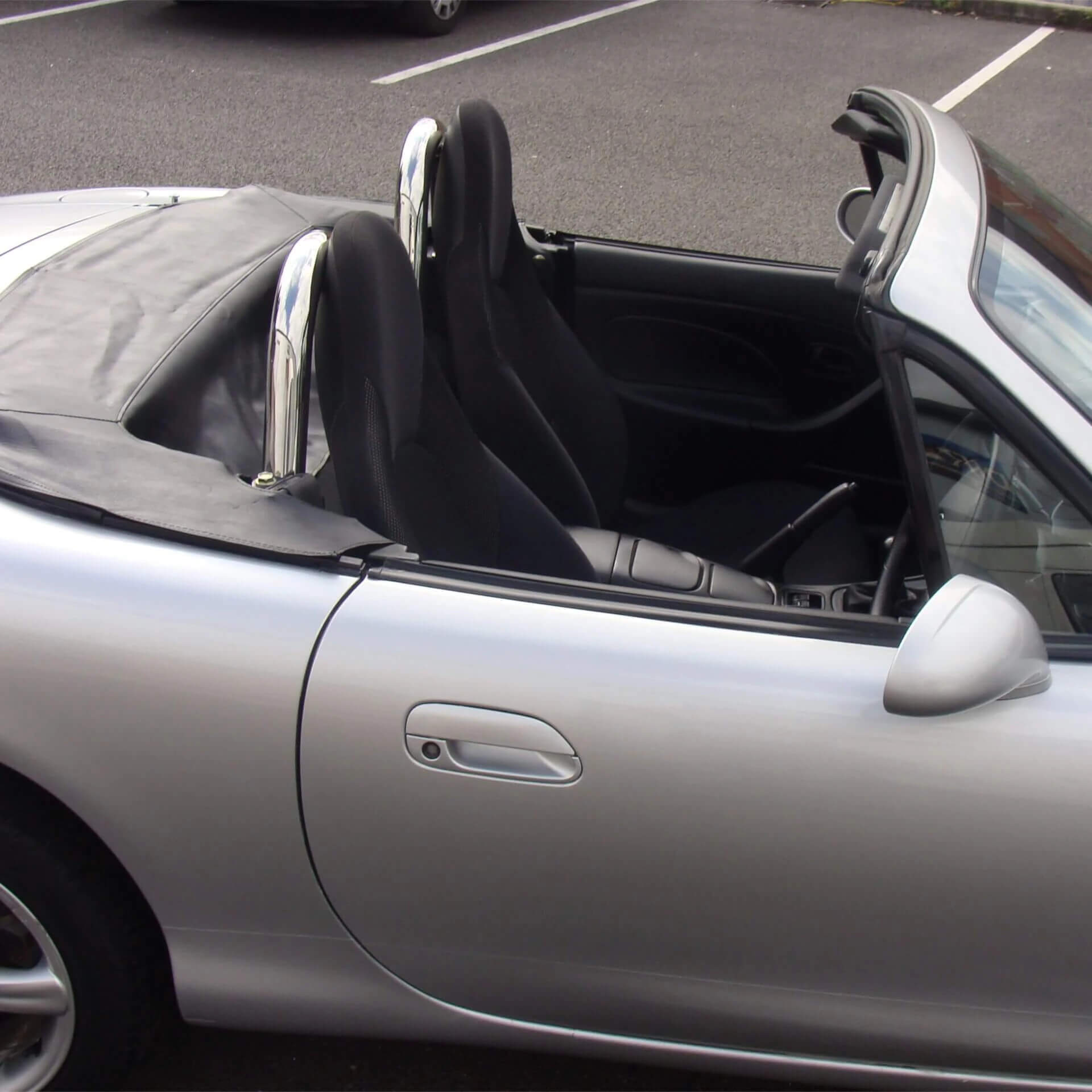 Direct4x4 accessories for Mazda MX-5 vehicles with a photo of a silver Mazda MX-5 fitted with our stainless steel roll bar