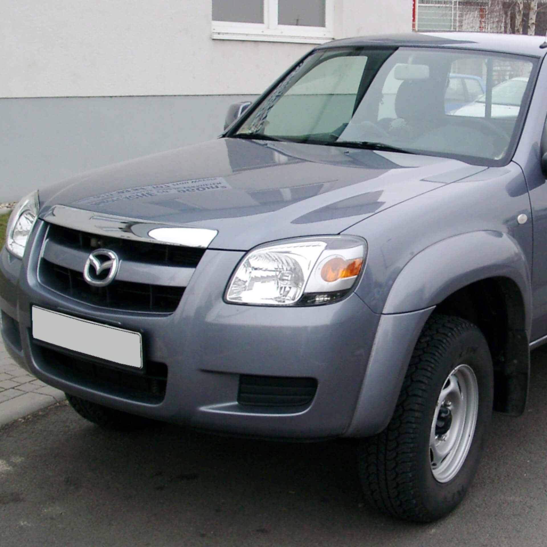 Direct4x4 accessories for Mazda BT-50 vehicles with a photo of the front of a grey Mazda BT-50