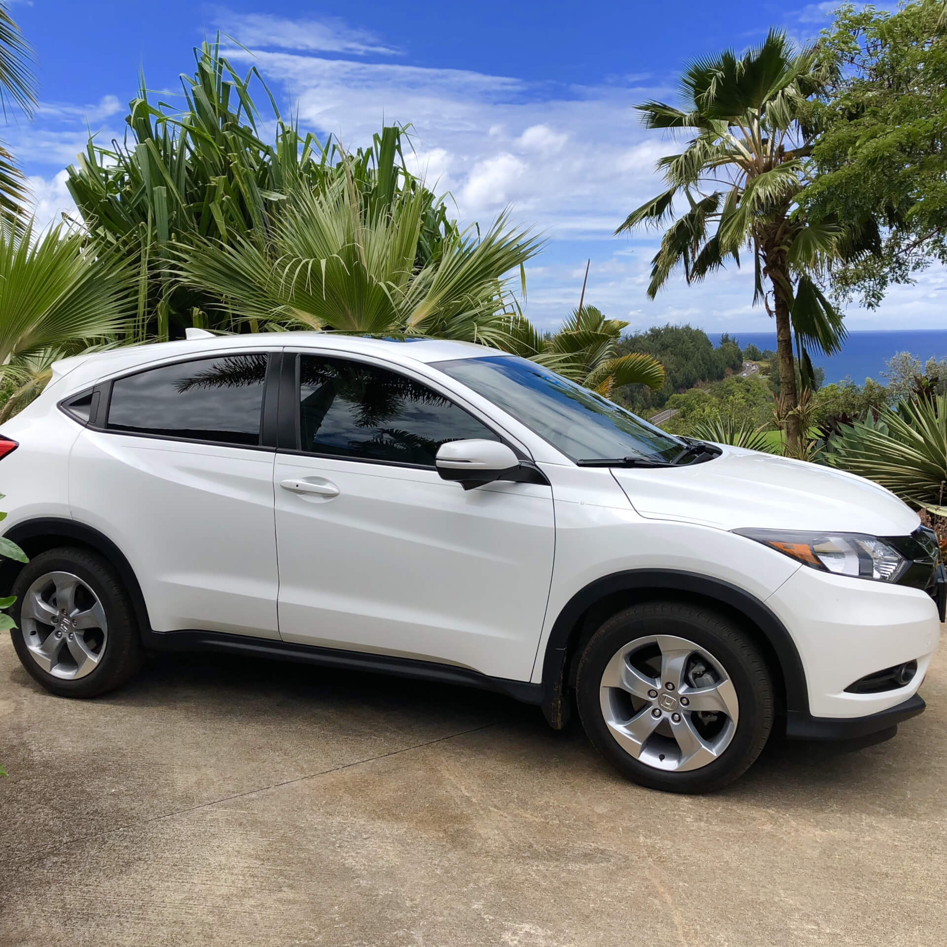 Direct4x4 accessories for Honda HR-V vehicles with a photo of a white Honda HR-V in a tropical location with palm trees