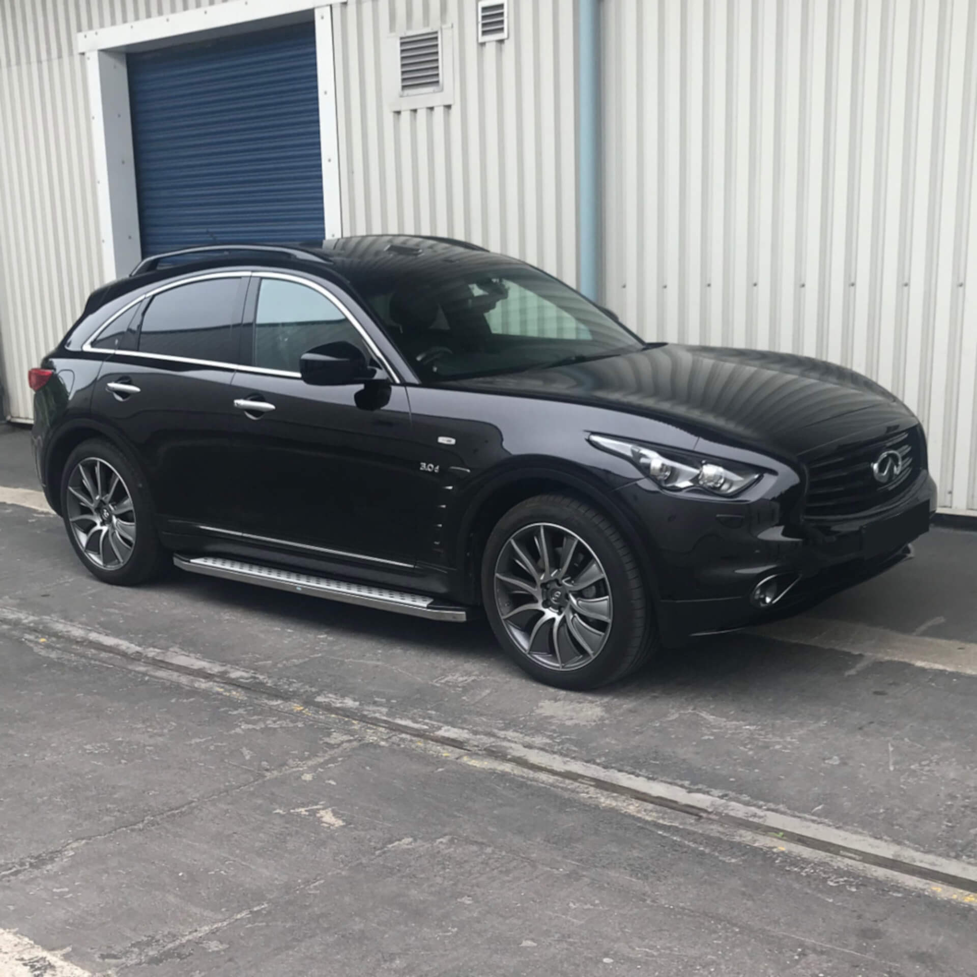 Direct4x4 accessories for Infiniti QX70 vehicles with a photo of a black Infiniti QX70 outside our offices fitted with our freedom side steps