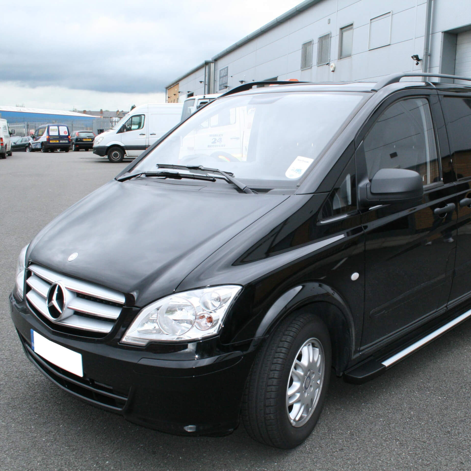 Direct4x4 accessories for Mercedes Vito/Viano vehicles with a photo of a black Mercedes Vito/Viano parked in a car park