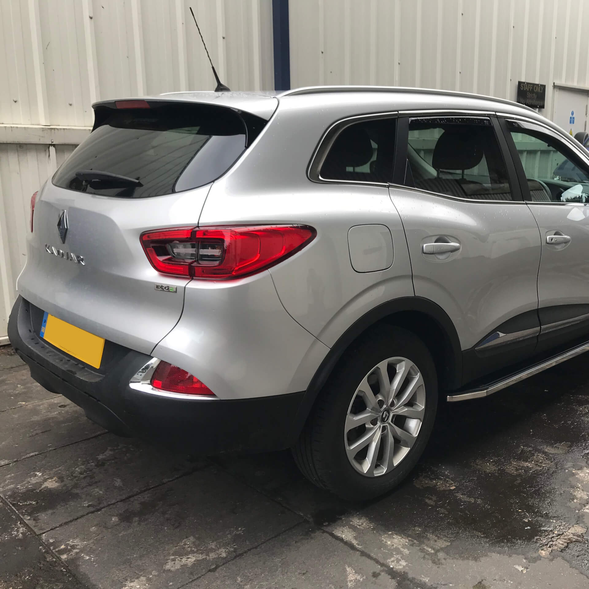 Direct4x4 accessories for Renault Kadjar vehicles with a photo of the back of a silver Renault Kadjar fitted with Raptor style side steps at our Derby depot