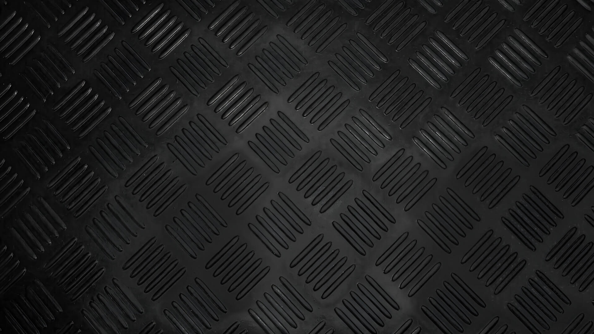 Photo of a black Direct4x4 tailored vehicle rubber floor mat