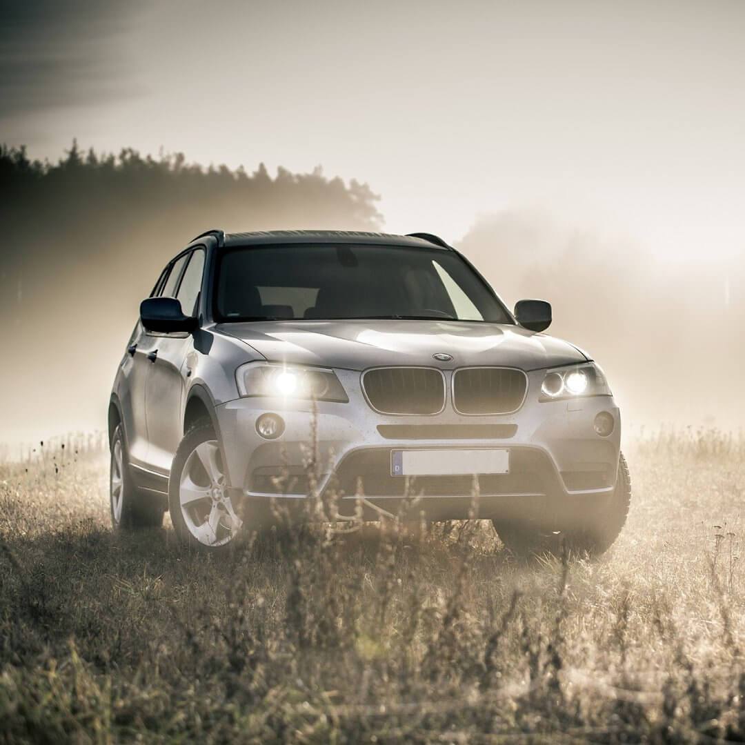 Direct4x4 accessories for BMW X3 vehicles with a photo of a BMW X3 parked in a misty field