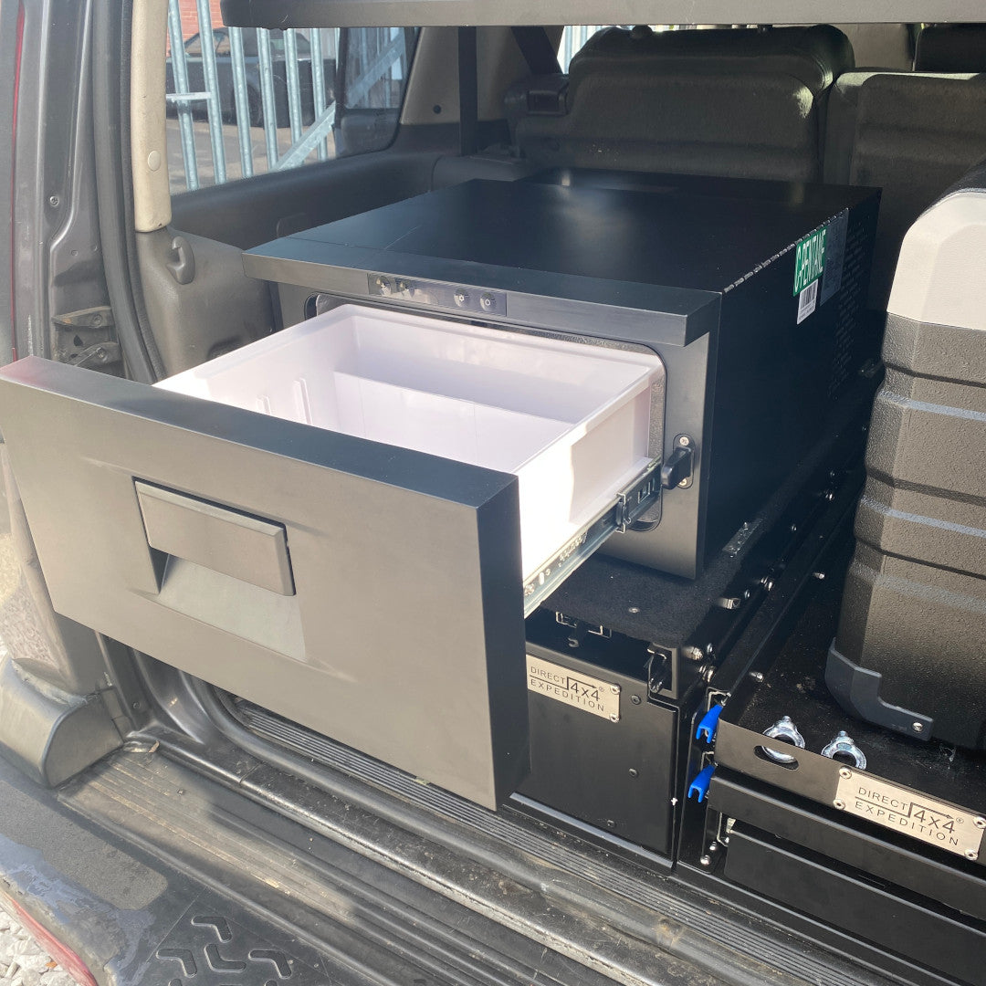 Photo of a Direct4x4 storage system setup in the back of a 4x4 vehicle.