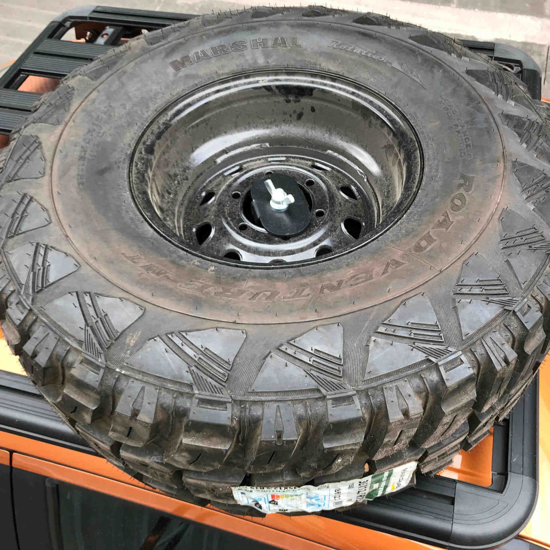 Spare tire on roof rack sale